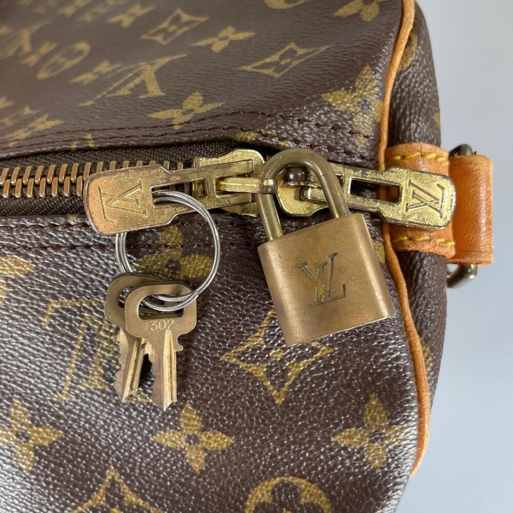 LOUIS VUITTON Brown Monogram Canvas Keepall 60 Boston Bag - Picture 12 of 15